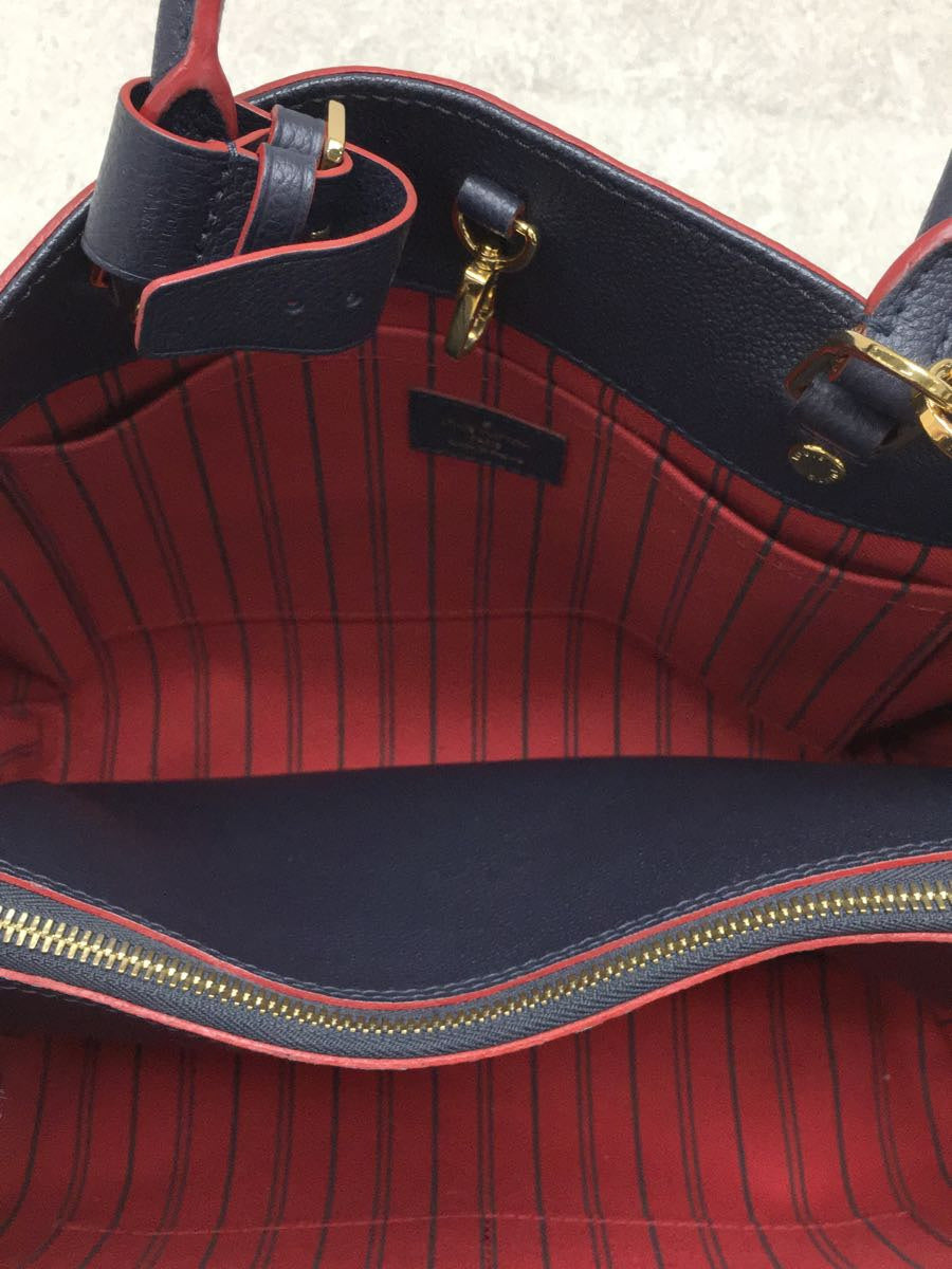 Louis Vuitton Montaigne MM Monogram Emplant Navy Cowhide Handbag