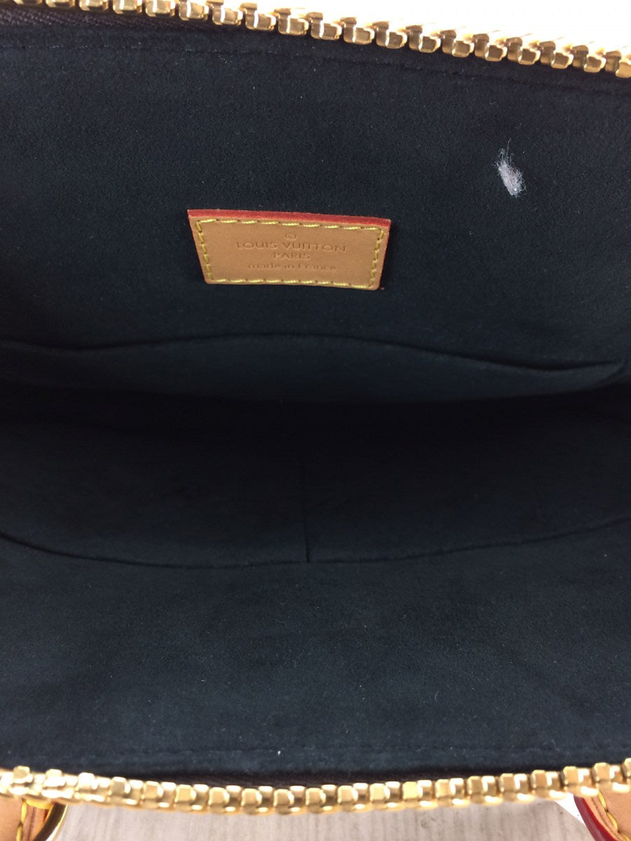 Louis Vuitton Monogram Moon Alma Handbag