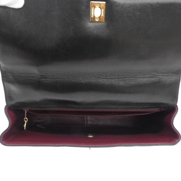 CHANEL Around 1995 Made Mademoiselle Stitch Turn-Lock Top Handle Bag Black