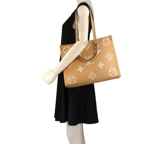 Louis Vuitton Monogram Implant On The Go MM Tote Bag