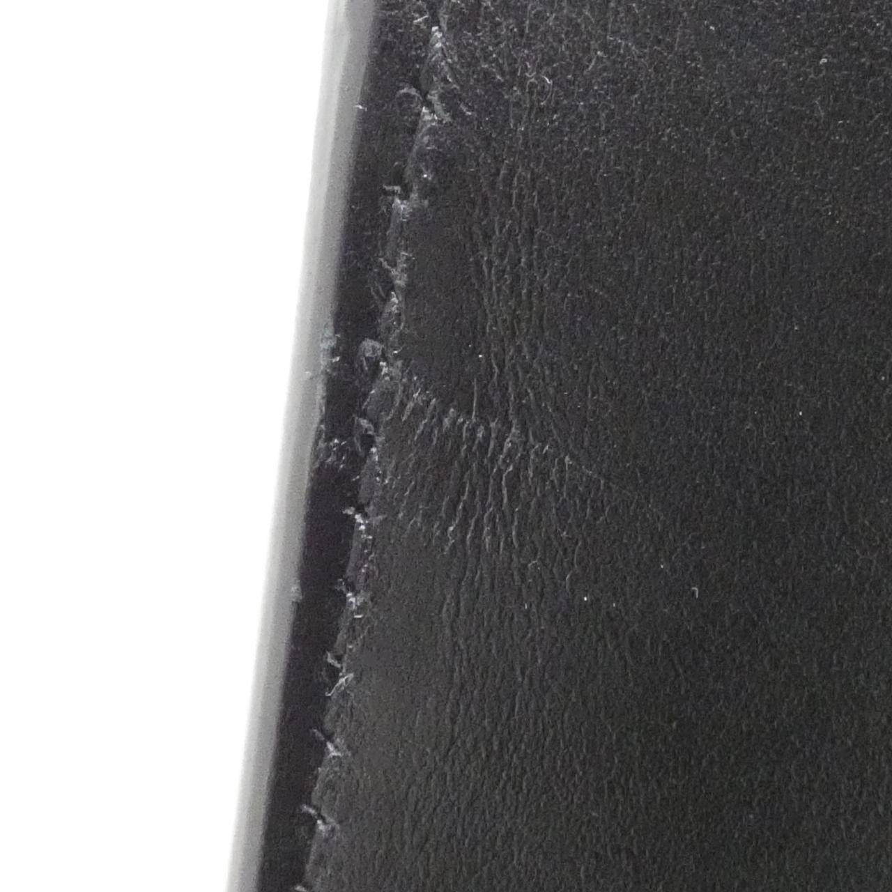 Gucci GG Embossed Leather Bag