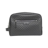 Gucci Microguccissima Leather Clutch Bag