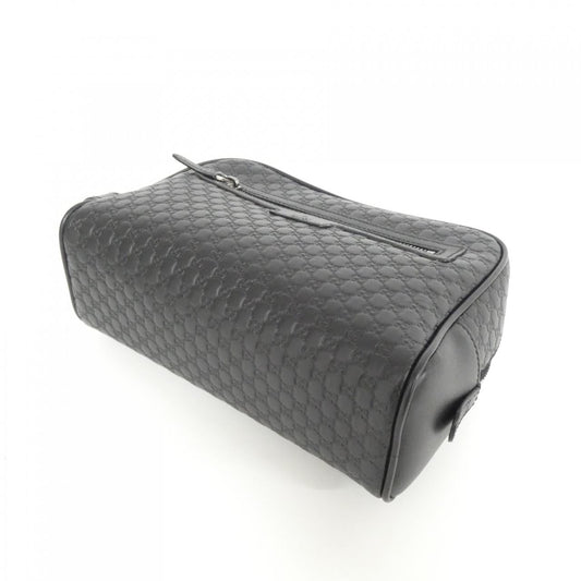 Gucci Microguccissima Leather Clutch Bag