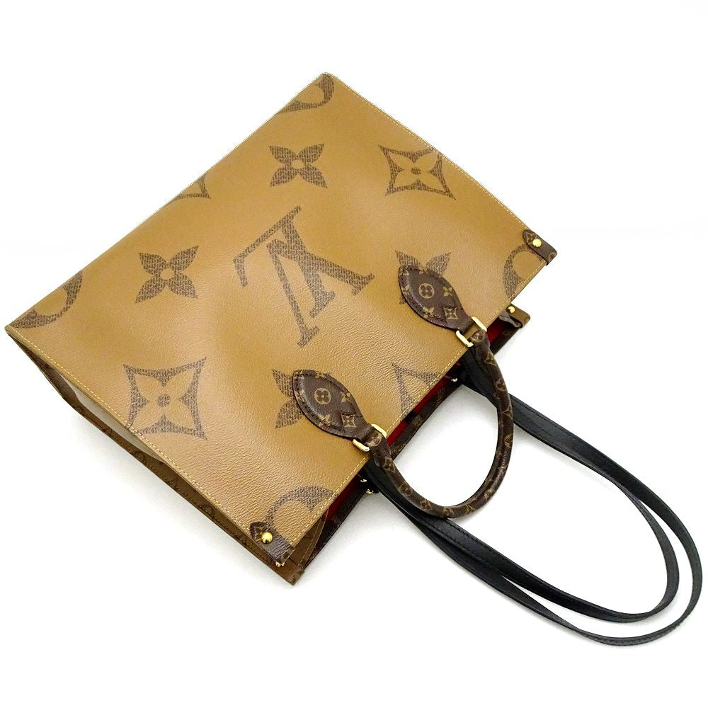 Louis Vuitton Monogram Giant Reverse On The Go MM Brown