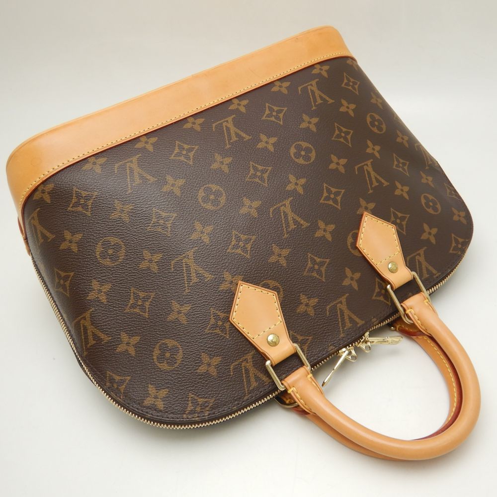 Louis Vuitton Monogram Alma Handbag Brown