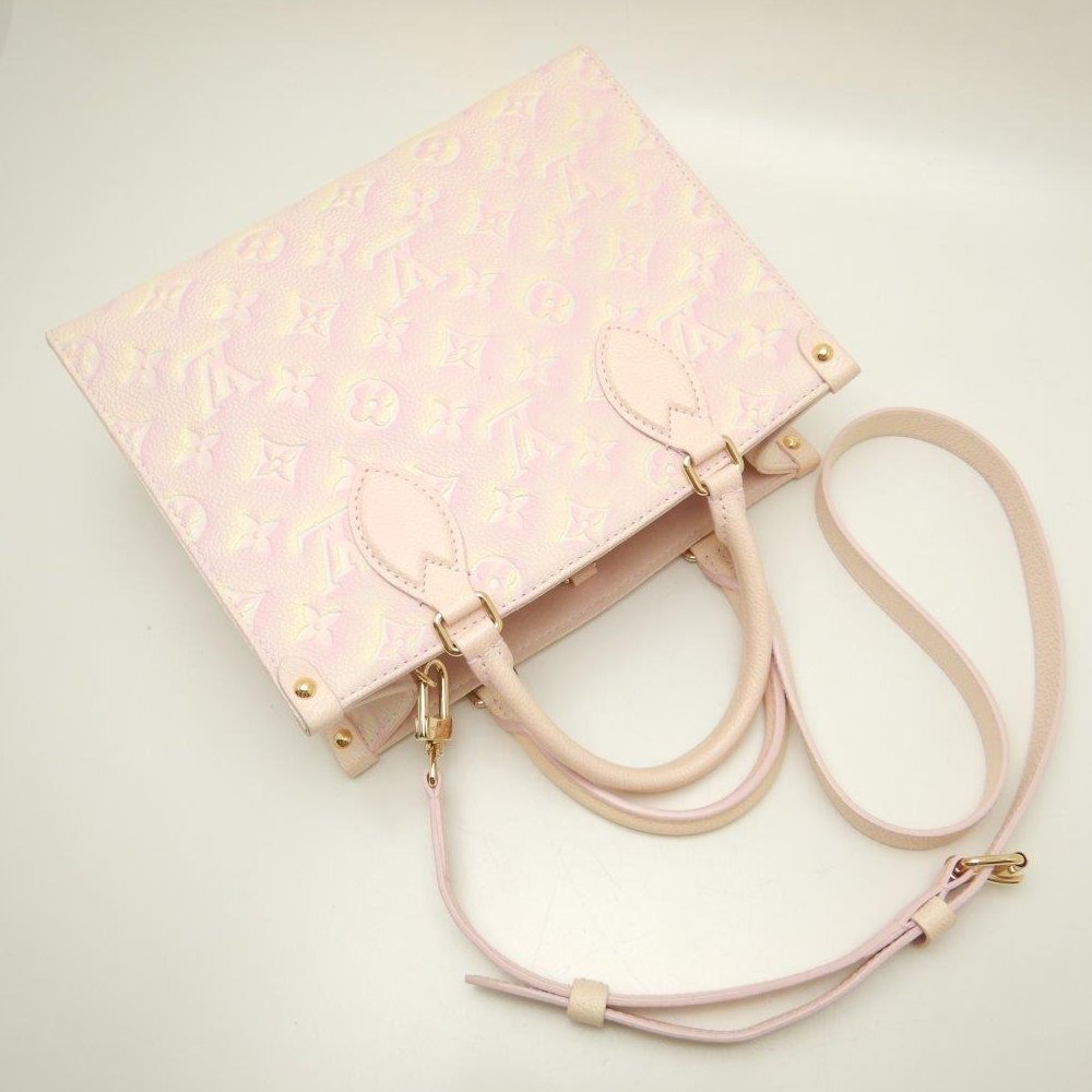 Louis Vuitton On The Go PM Emplant Handbag Light Pink
