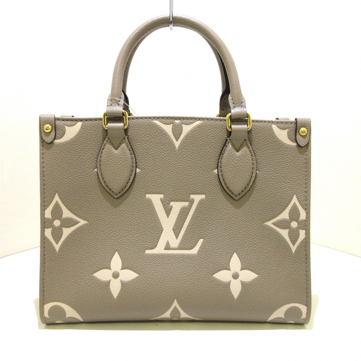 Louis Vuitton On The Go PM Handbag Tourtrail Creme Embossed