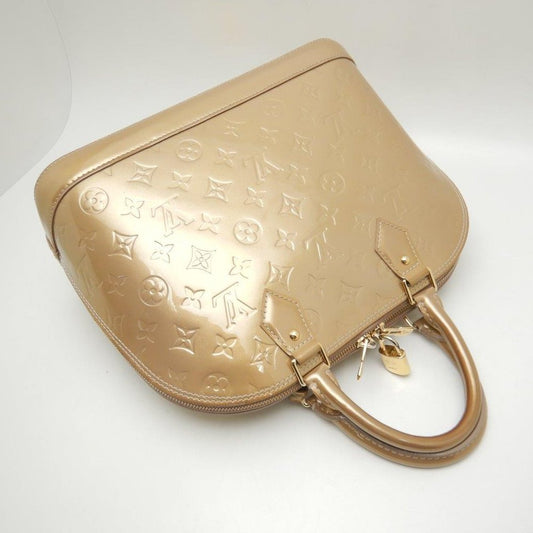 Louis Vuitton Vernis Alma Beige Poodle Handbag