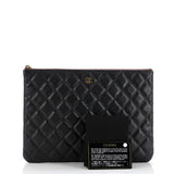 O Case Clutch Quilted Caviar Medium