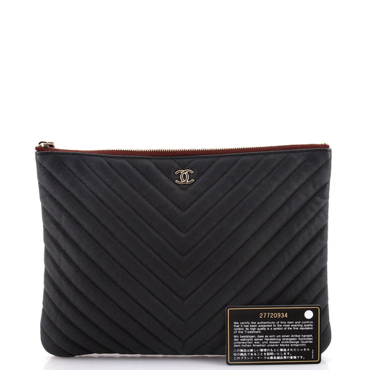 O Case Clutch Chevron Caviar Medium