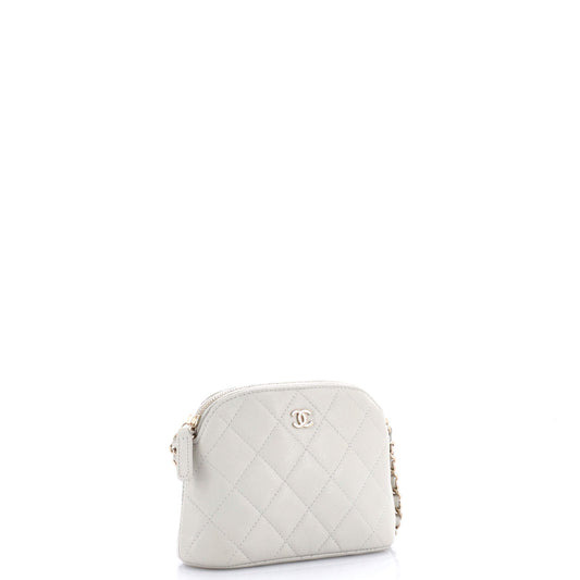 CC Dome Zip Clutch with Chain Quilted Caviar Mini
