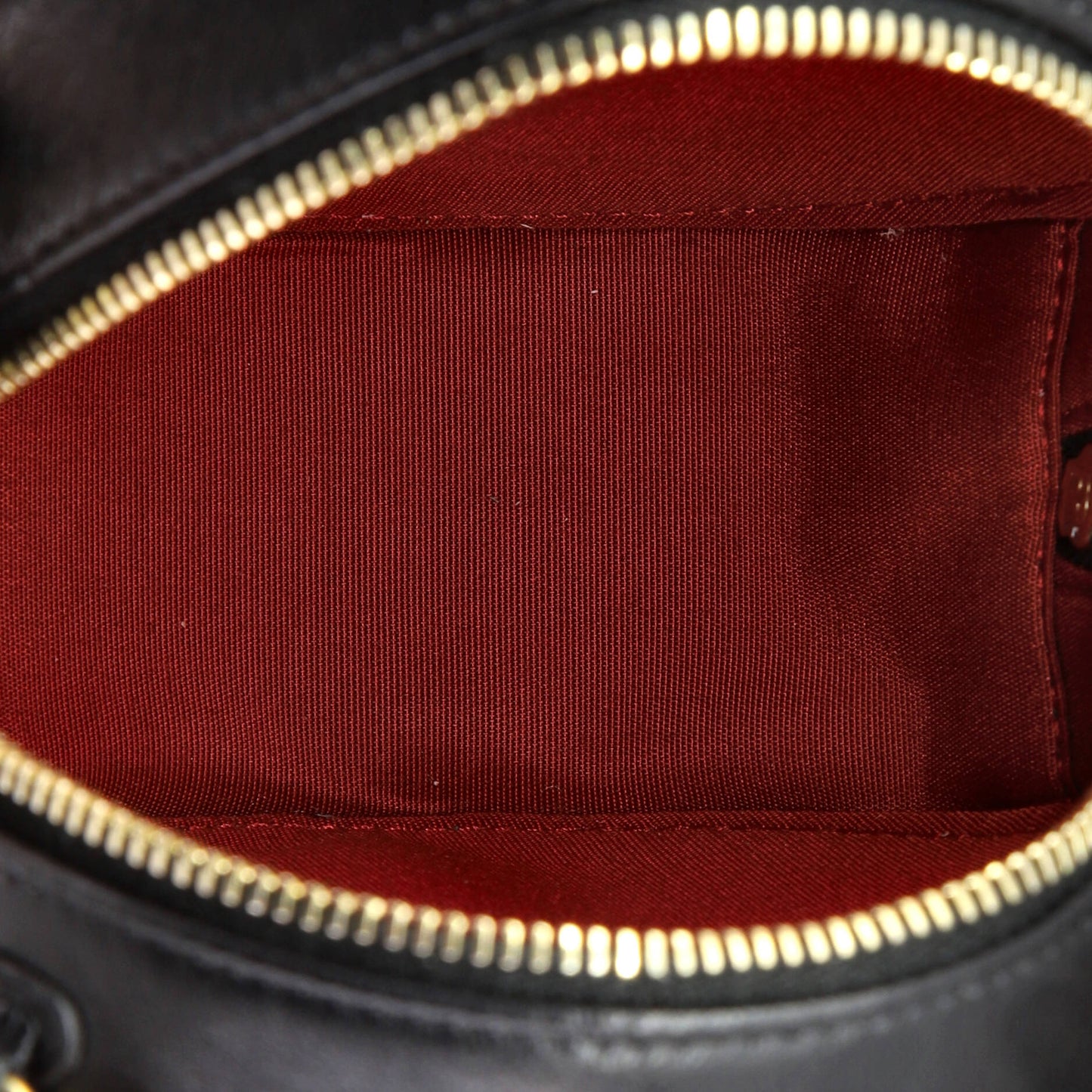 19 Round Clutch with Chain Quilted Leather