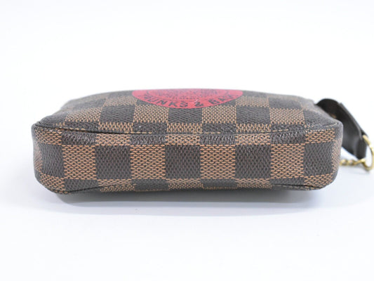 Louis Vuitton Mini Pochette Accessoires  Calfskin Clutch Bag