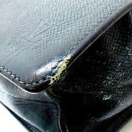 Louis Vuitton Pochette Clad Episea Taiga Leather Handbag