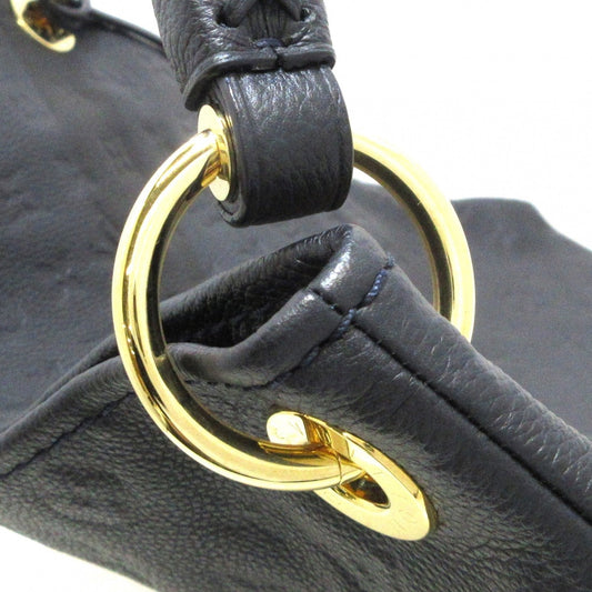 Louis Vuitton Artsy MM Monogram Empreinte Leather Handbag