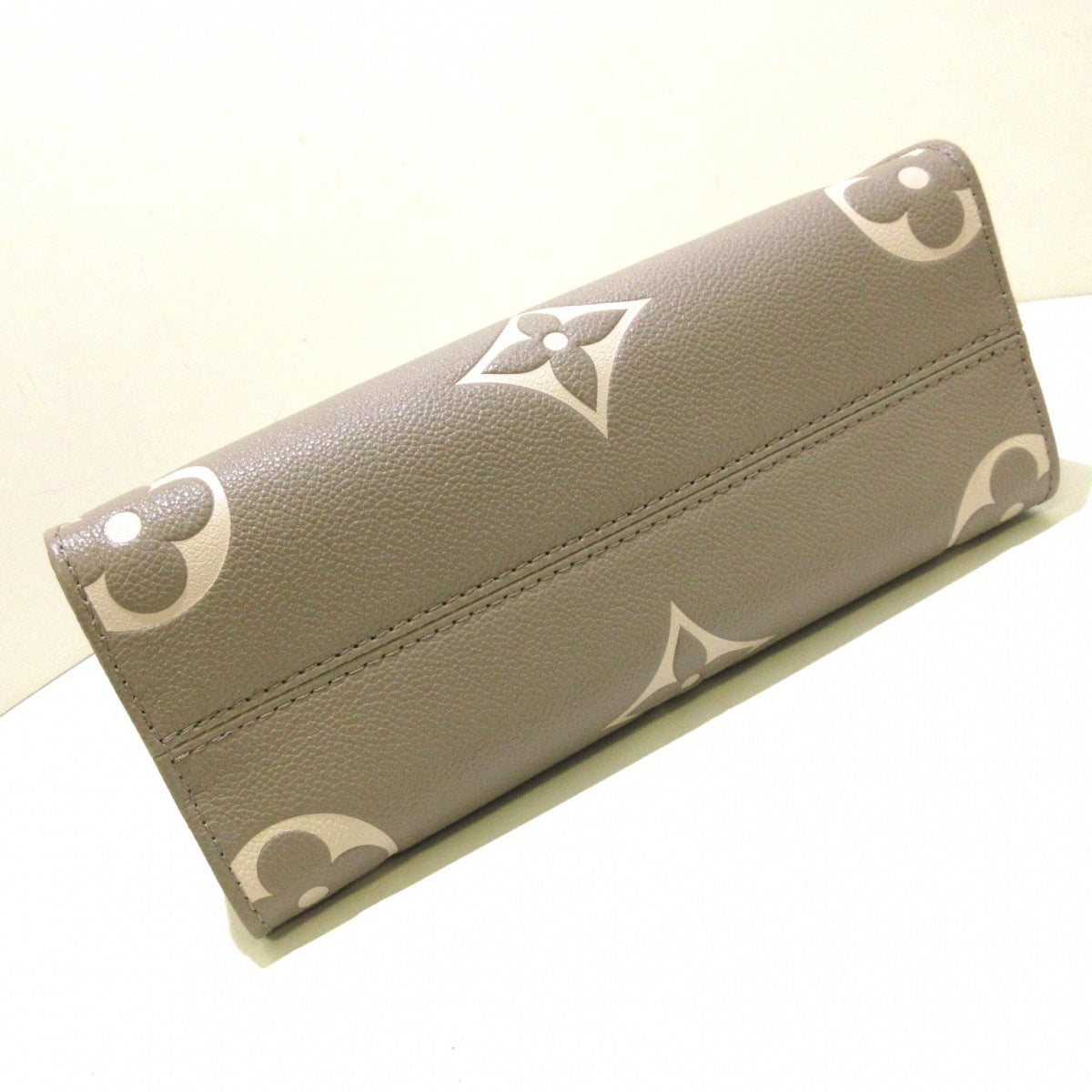 Louis Vuitton On The Go PM Handbag Tourtrail Creme Embossed