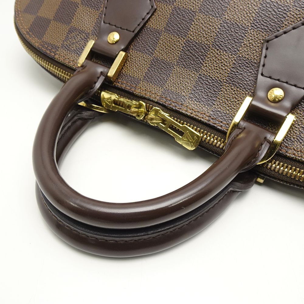 Louis Vuitton Damier Alma Ebene Handbag