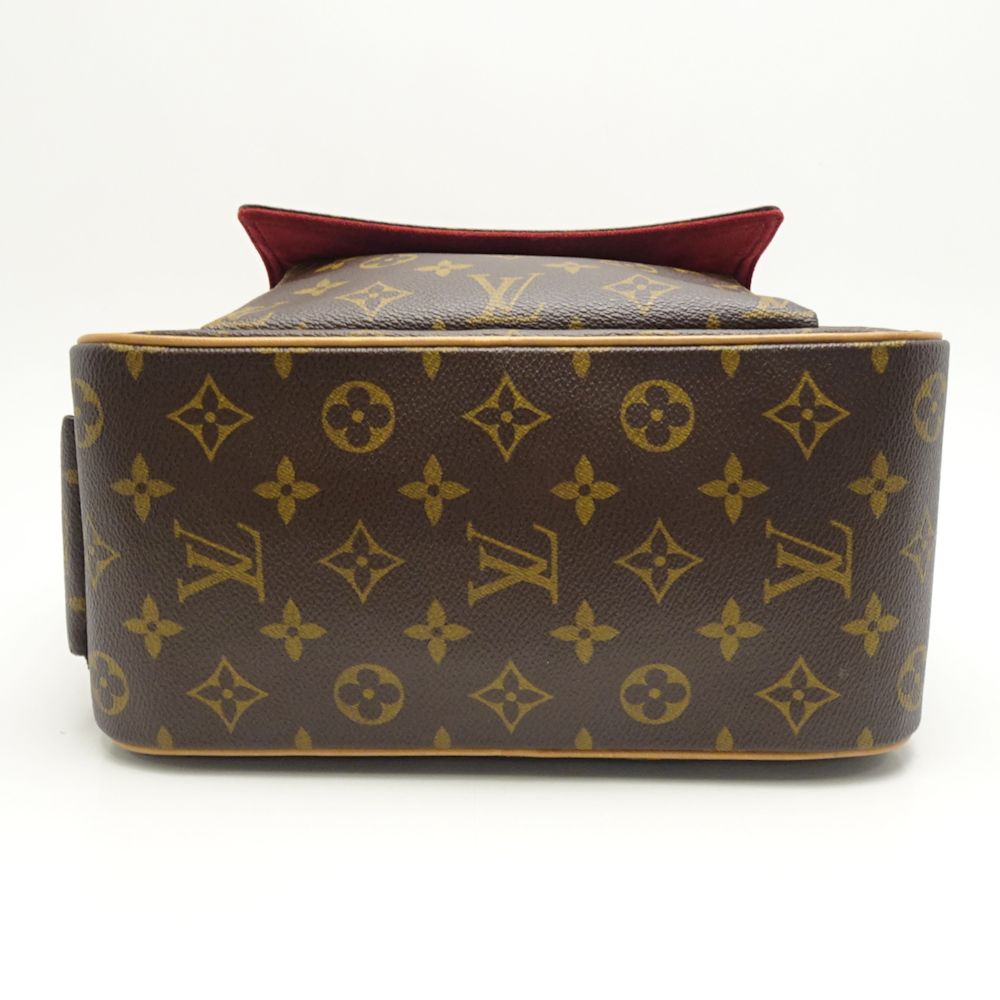 Louis Vuitton  Monogram Eccentric Cité Brown Handbag