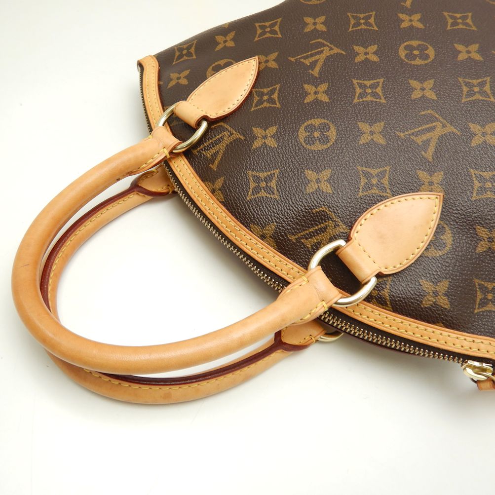 Louis Vuitton Monogram Lockit Brown Handbag