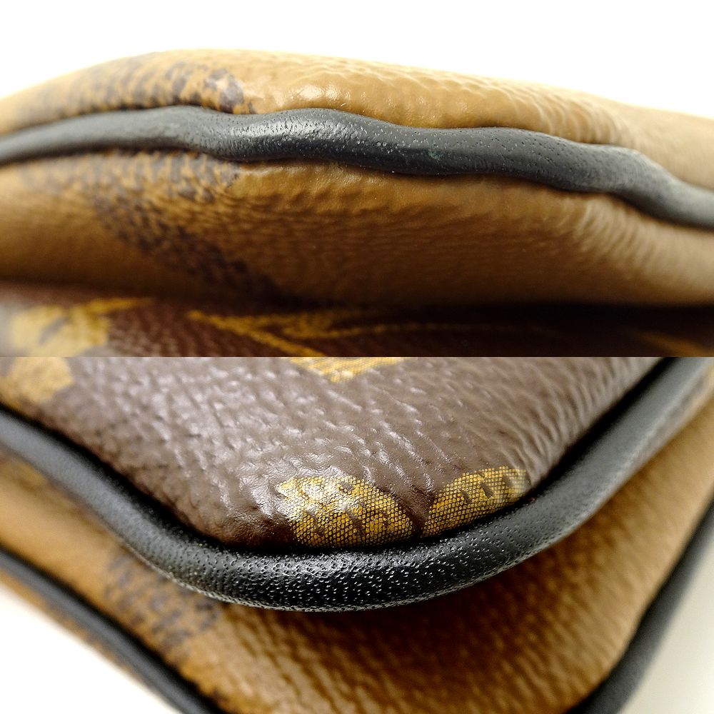 Louis Vuitton  Pochette Double Zip Monogram