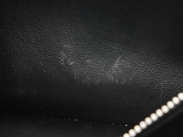 Louis Vuitton Zippy Lock Me Taurillon Noir Black Long Wallet