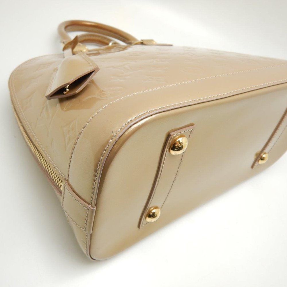 Louis Vuitton Vernis Alma Beige Poodle Handbag