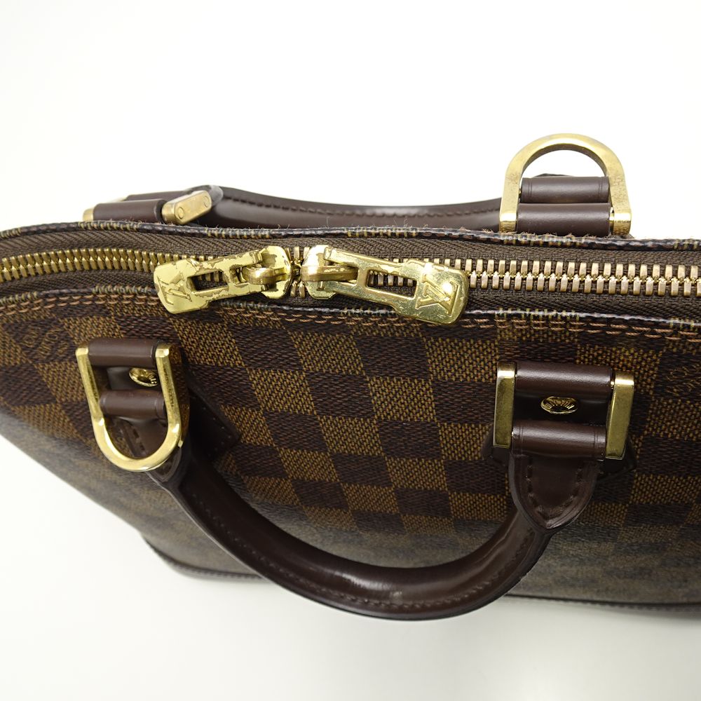 Louis Vuitton Damier Alma Ebene Handbag
