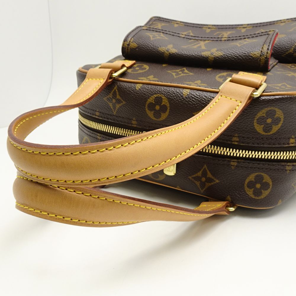 Louis Vuitton  Monogram Eccentric Cité Brown Handbag