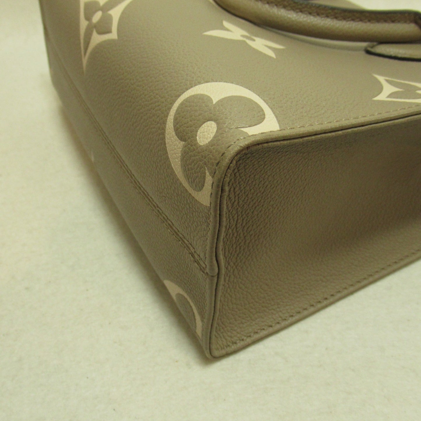 Louis Vuitton On The Go PM Handbag Leather Monogram Implant