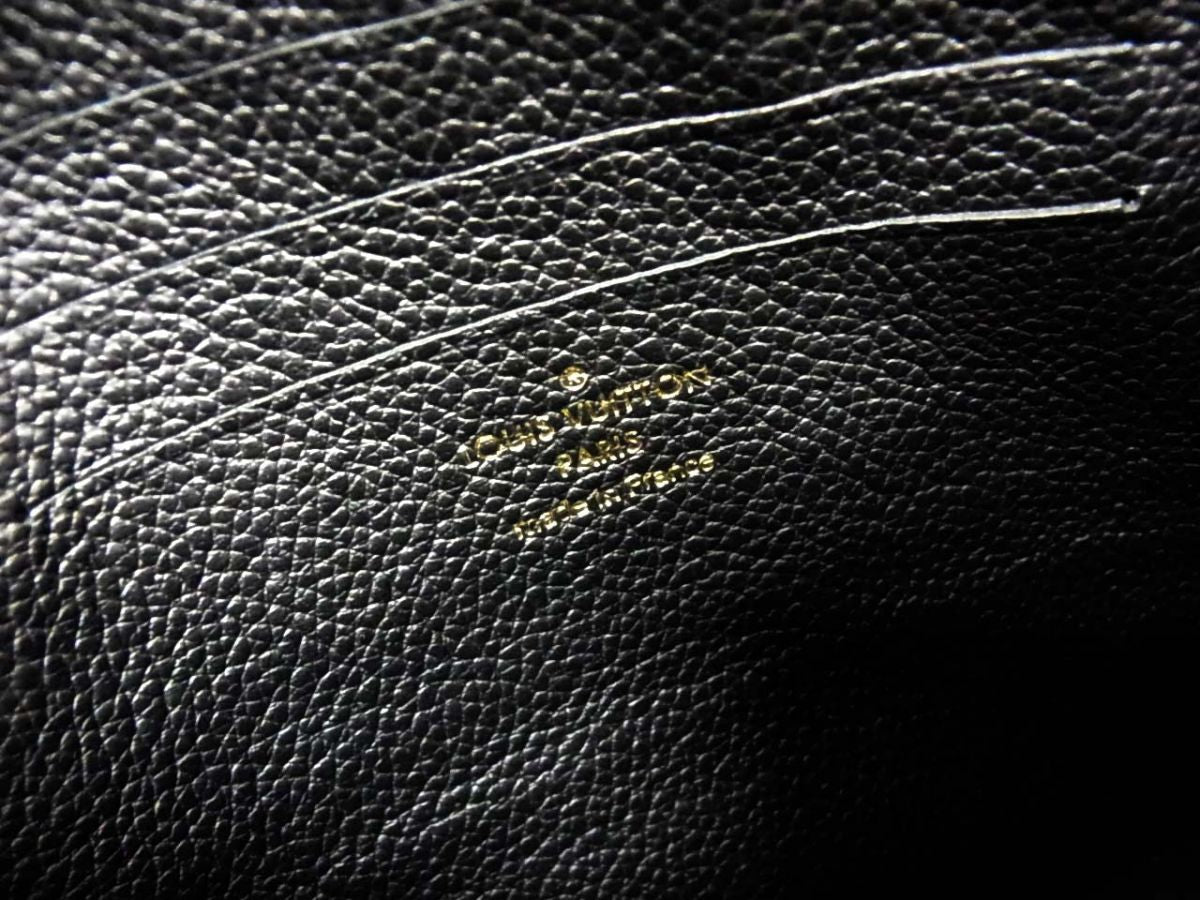 Louis Vuitton Monogram Empreinte Pochette Melanie Clutch Bag