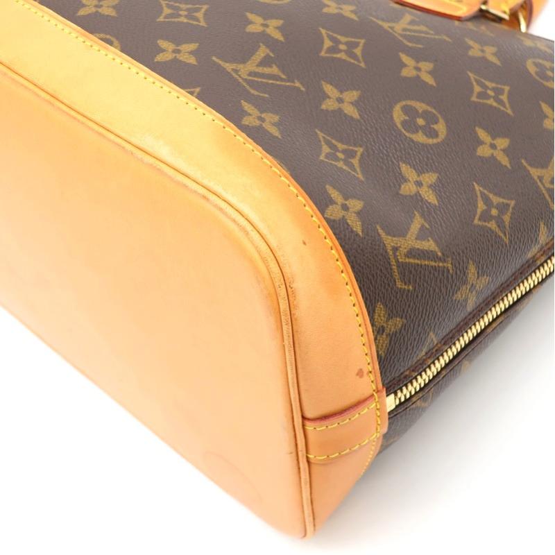 Louis Vuitton Alma Monogram Handbag
