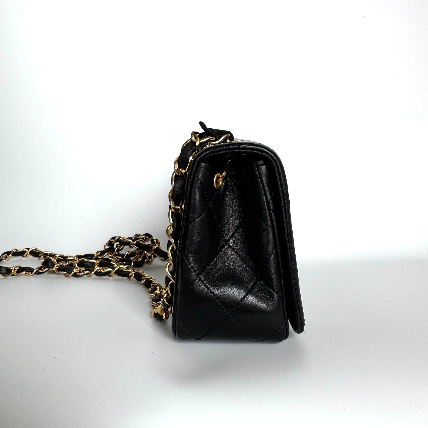 Chanel Classic Flap Mini   1989-1991 Black Lambskin Leather with 24k Gold Hardware