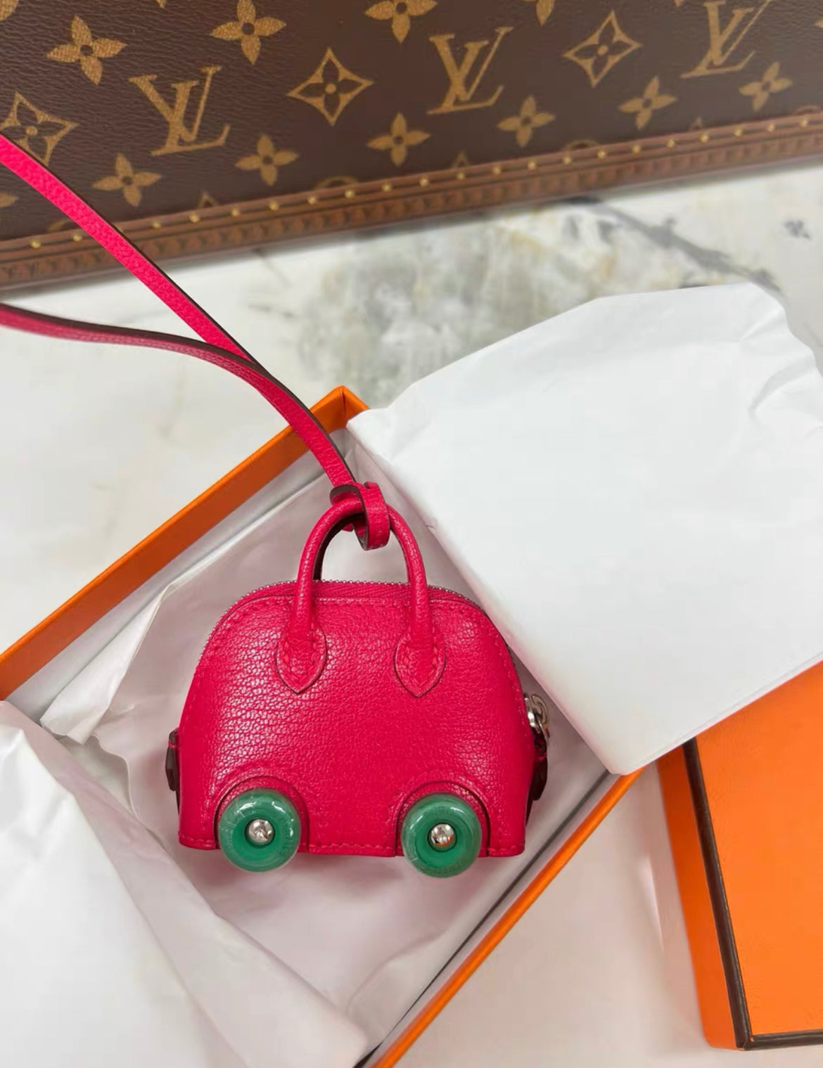 Hermes Bolide on Wheels Charm?Rose extreme/Vert vertigo Chevre chamkila goatskin Silver hardware