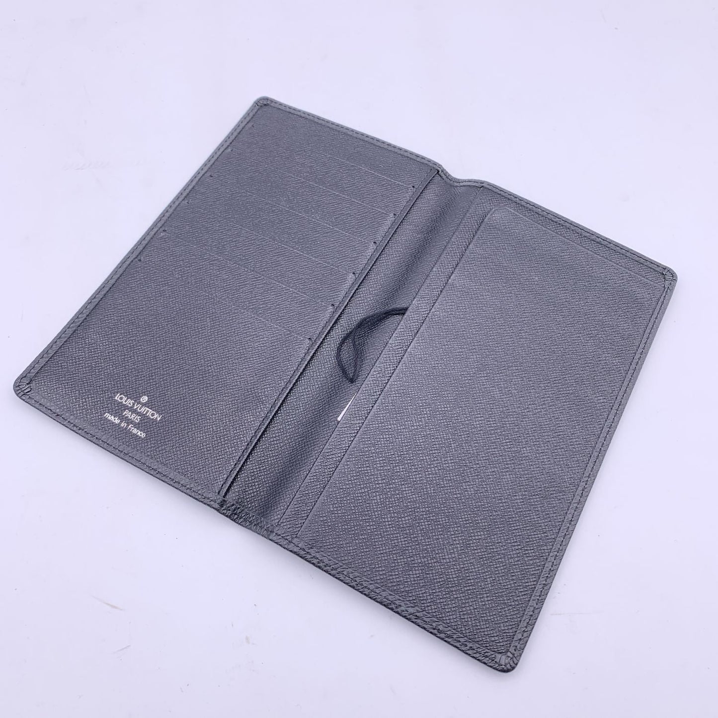 LOUIS VUITTON   Black Taiga Leather Vertical Bifold Long Wallet
