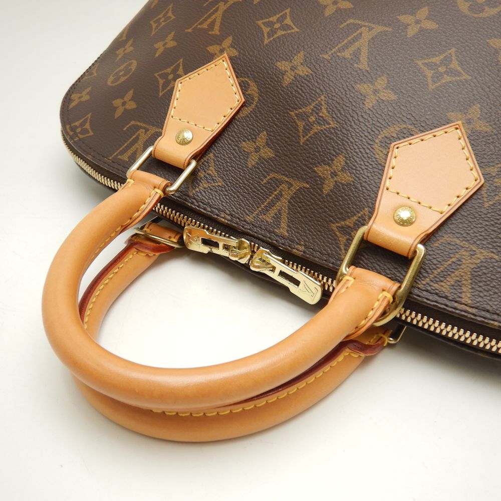 Louis Vuitton Monogram Alma Handbag Brown
