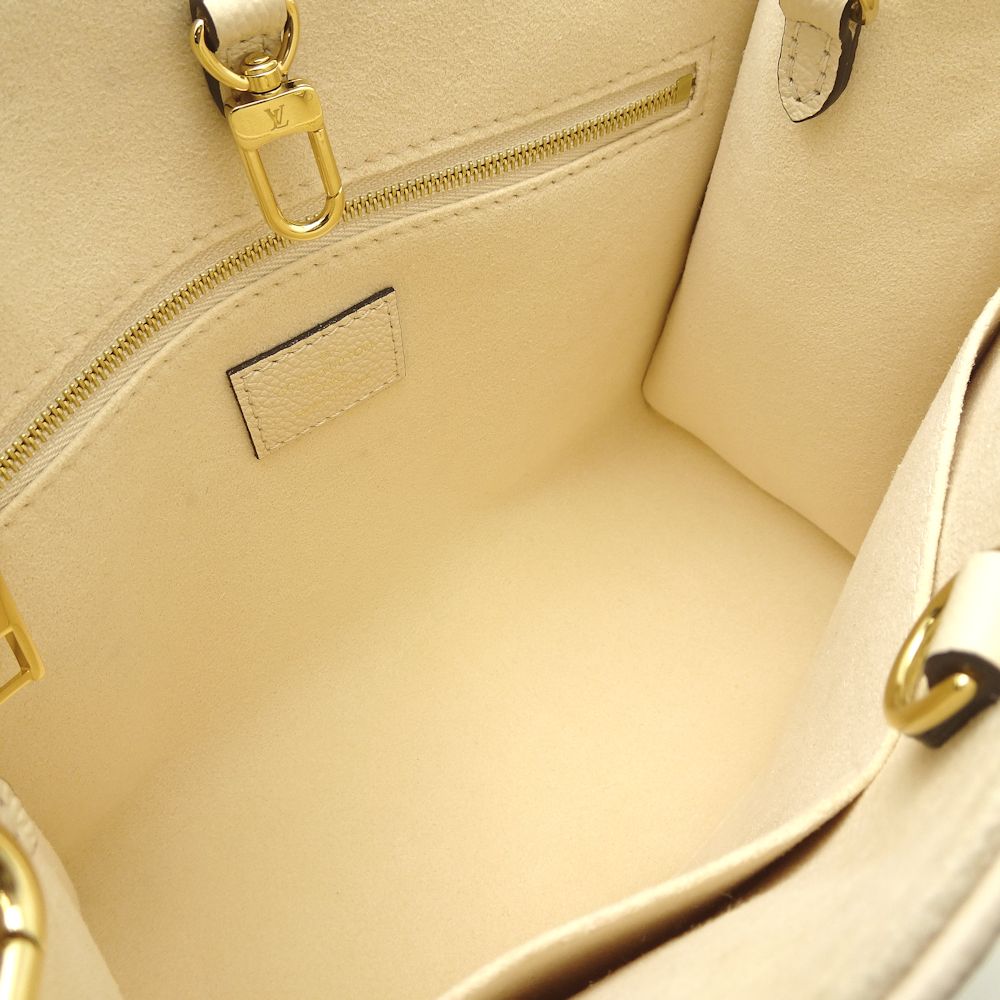 Louis Vuitton On The Go PM Amplant Bicolor Crème Bois de Rose