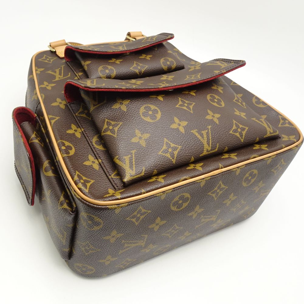 Louis Vuitton  Monogram Eccentric Cité Brown Handbag