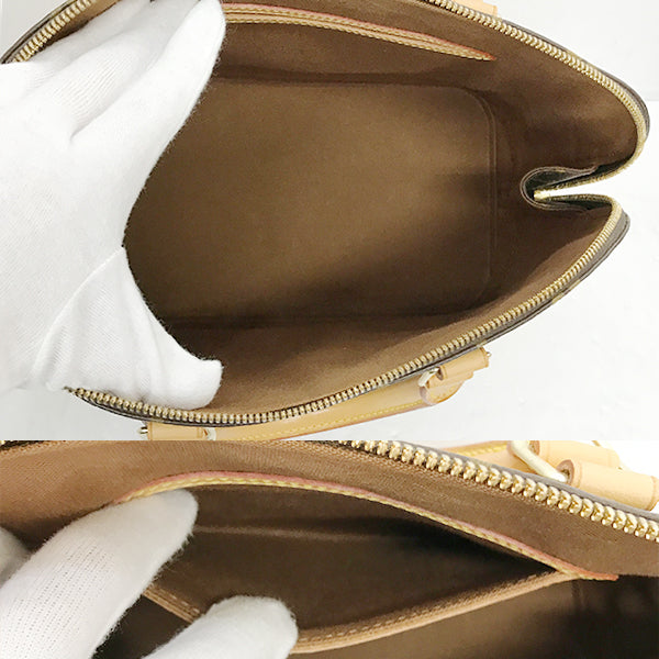 Louis Vuitton Alma Monogram Handbag Brown