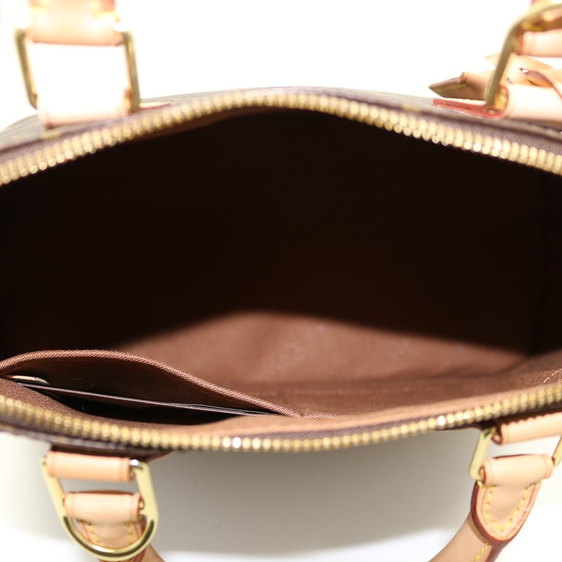 Louis Vuitton Alma PM Monogram Handbag