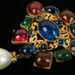 Broche en pâte de verre Chanel