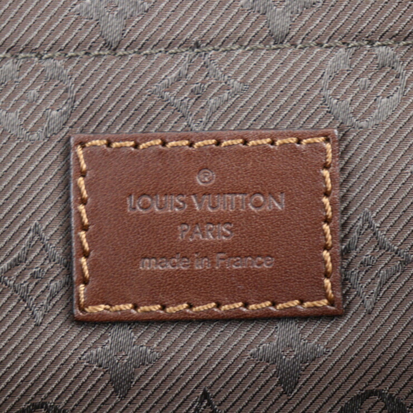 Louis Vuitton Onatah  Leather Clutch Bag
