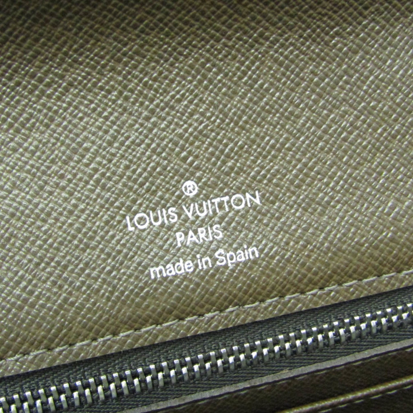 Louis Vuitton Selenga  Leather Clutch Bag