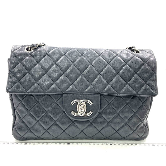 Chanel Classic Flap Maxi Black Soft Caviar Leather Silver-tone Hardware Giant CC Logo