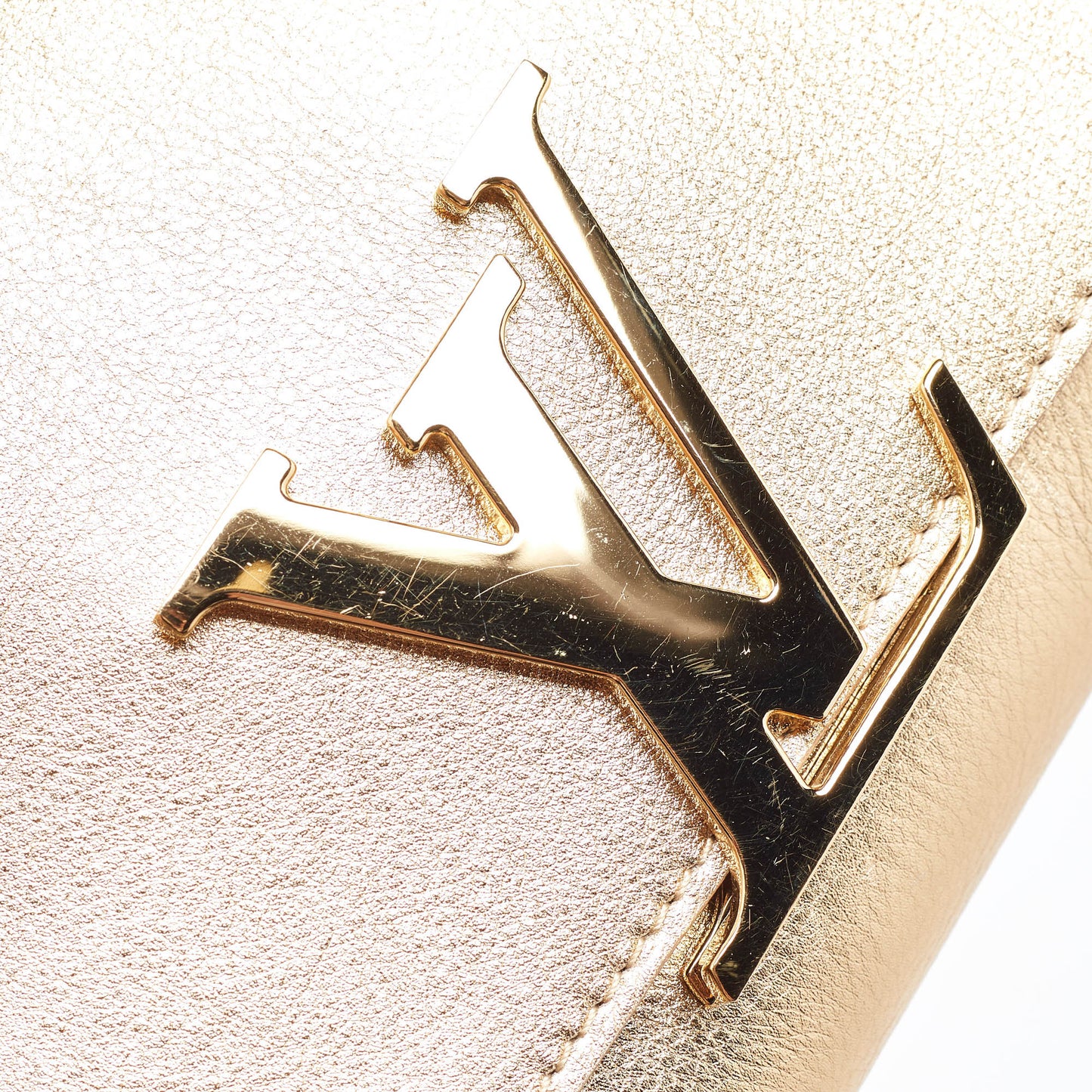 Louis Vuitton  Gold Leather Louise Clutch