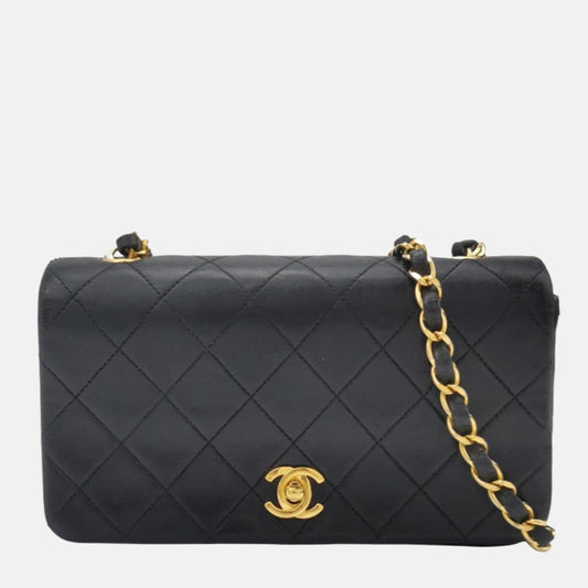 Chanel Classic Flap Mini   1989-1991 Black Lambskin Leather with 24k Gold Hardware