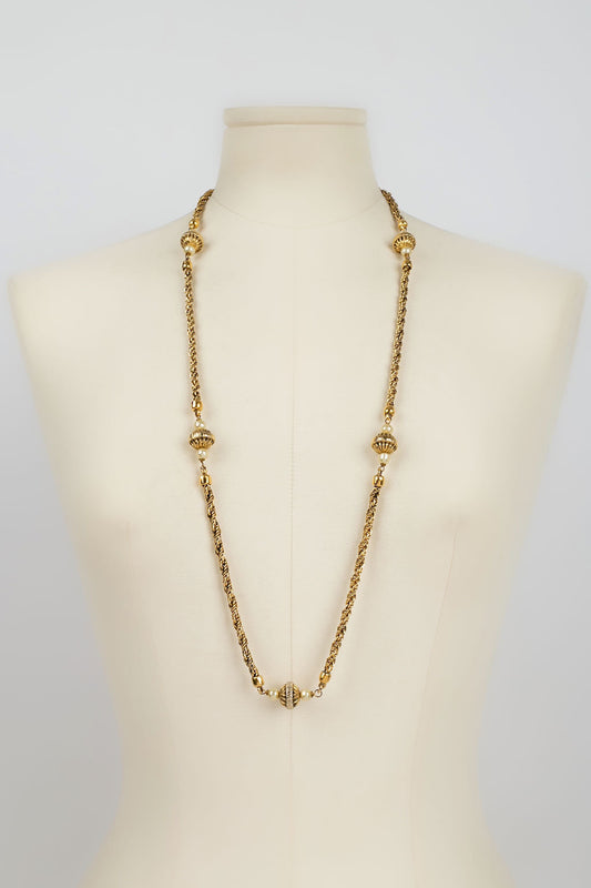 Collier doré Chanel 1984