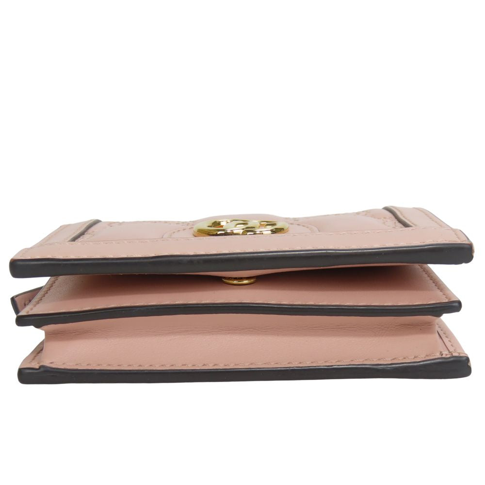 Gucci GG Matelasse Leather Bifold Wallet