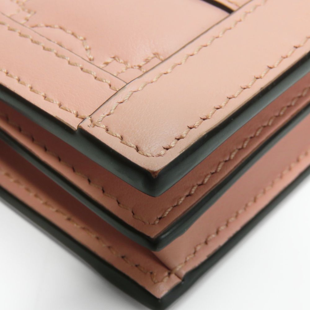 Gucci GG Matelasse Leather Bifold Wallet