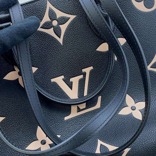 Louis Vuitton  Monogram Implant On The Go MM Shoulder Bag