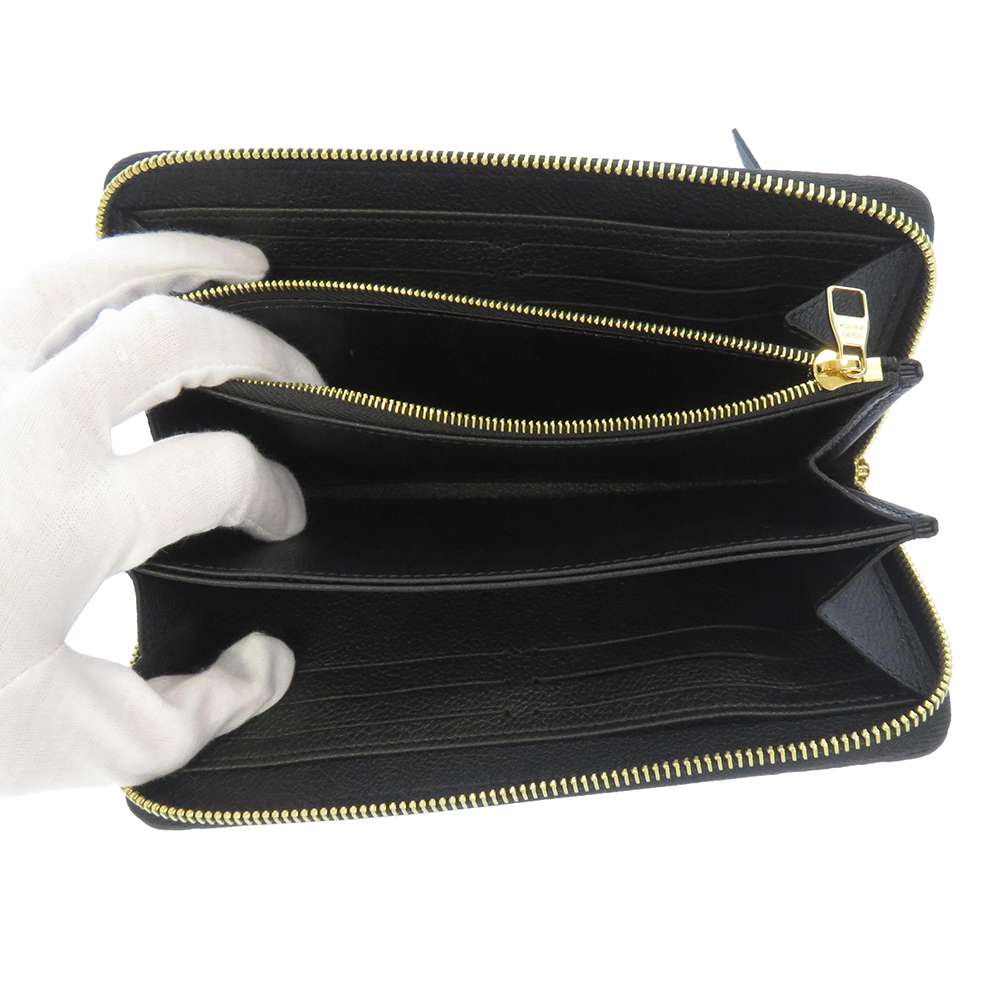 Louis Vuitton Monogram Implant Zippy Wallet